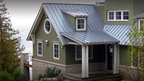 metal roof on green sided craftsman house|light green metal roofing.